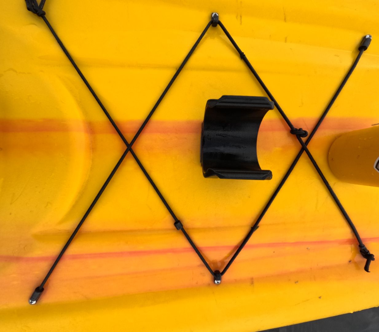 Yellow paddle board with black bungee cords and a secure water bottle holder attached with high strength 3M VHB tape for stability.