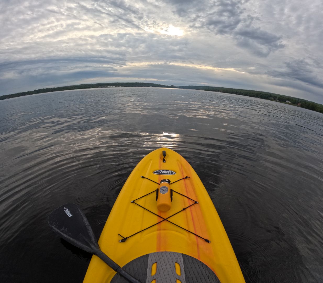 Yellow paddle board with water bottle holder secured by high-strength 3M VHB tape, ideal for stable hydration during serene lake outings.