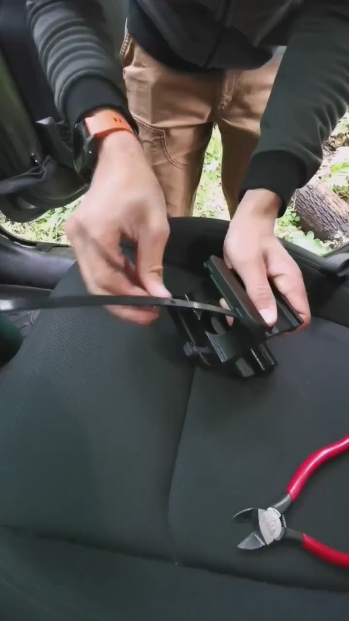 Instructional video demonstrating the installation of Jeep JL grab handle water bottle holder, highlighting simple tools required, precise mounting points, and secure fit for rugged off-road use