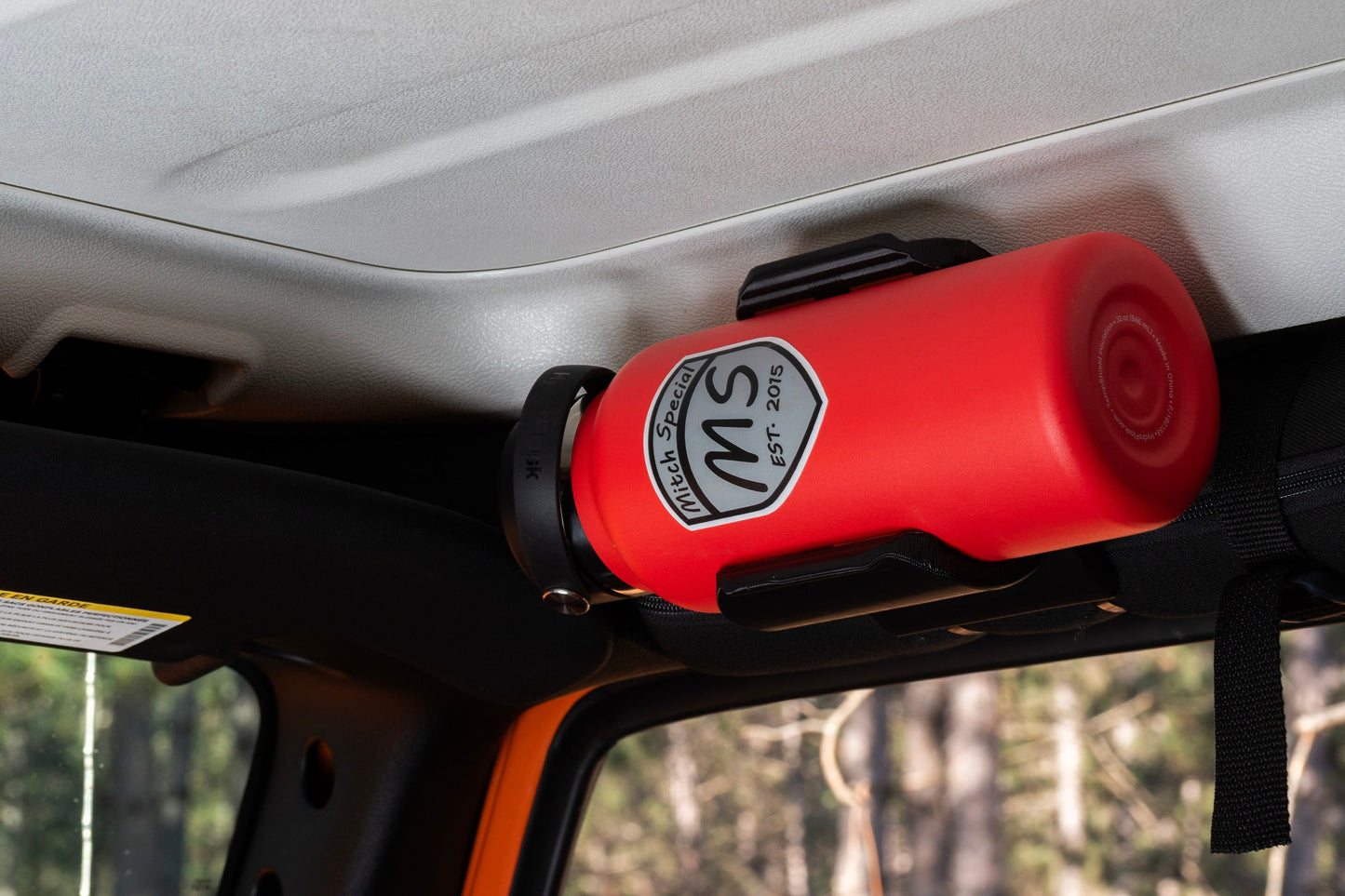 Close-up view of Heavy-Duty Water Bottle Holder for Jeep Wrangler  roll bar, showcasing durable construction and 4 silicone inserts for secure grip